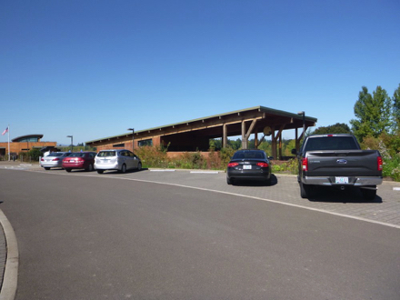 Parking lot with accessible parking spaces - restrooms and covered picnic area - Wildlife Center